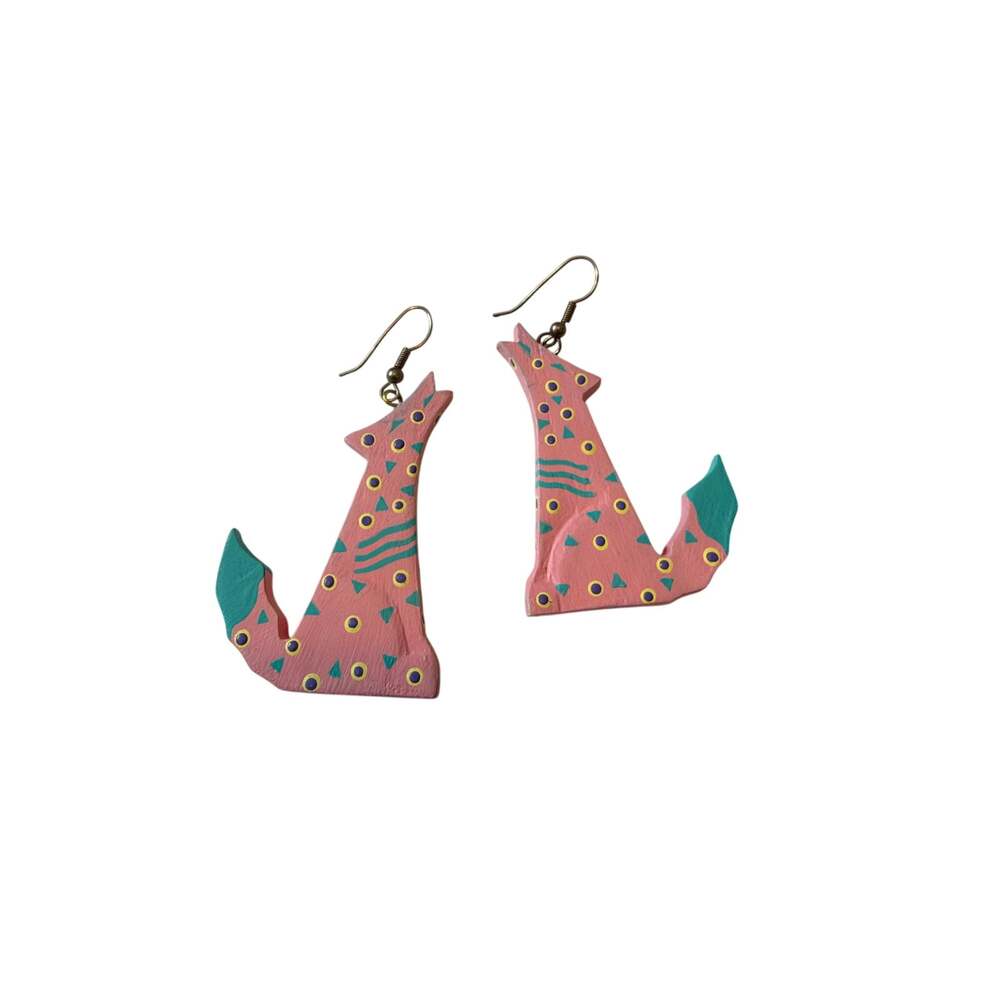 Vintage handmade pink polka dot painted wooden coyotes